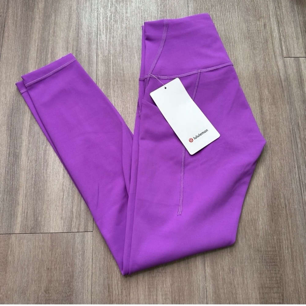 Lululemon Wunder Train High-Rise Tight with
Pockets 25" - Moonlit Magenta